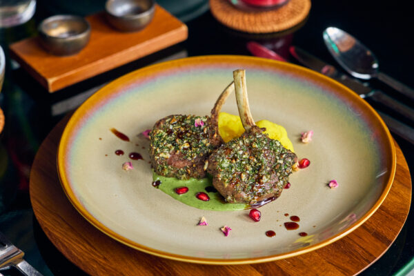 Perfectly cooked lamb rack steak with visible grill marks, representing nutrient-dense protein sources that help combat burnout and support mental wellbeing.